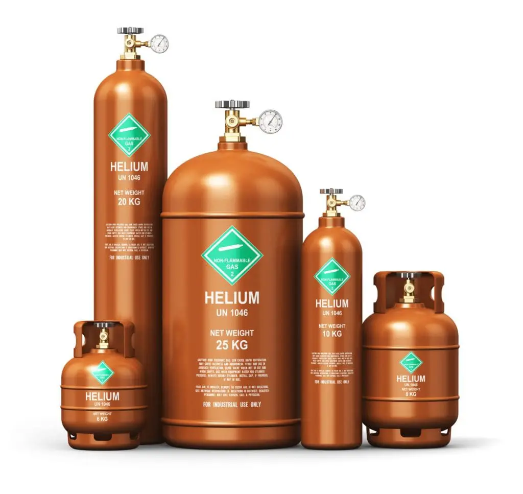 Five industrial helium canisters of varying sizes