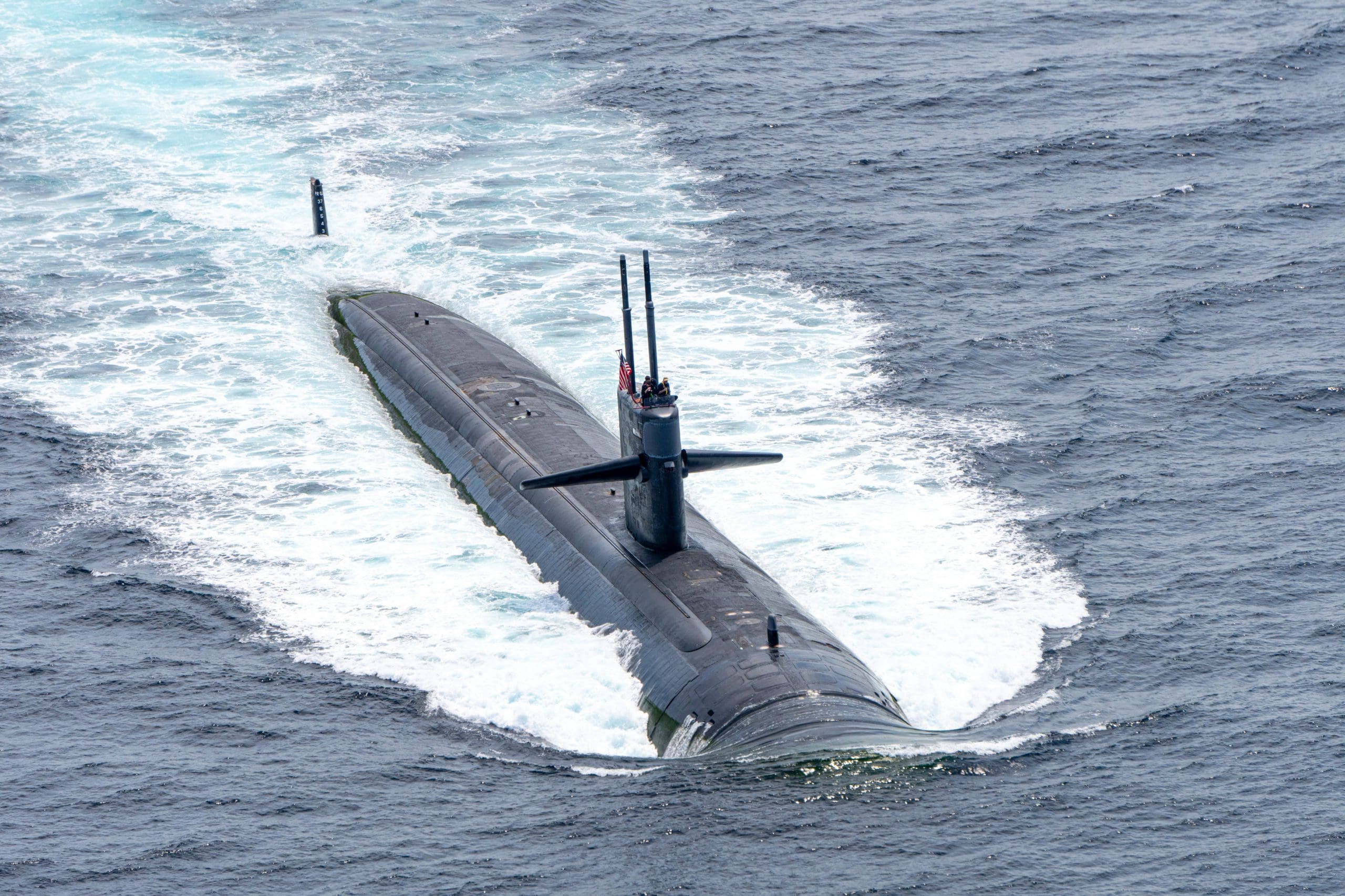 USS Louisville fast attack submarine of U.S.Navy sails on the su