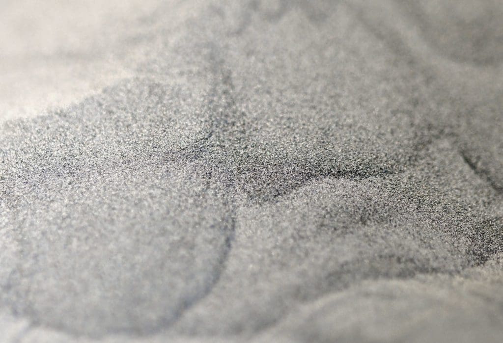 close up image of gray powdered metal of type possibly used for high-pressure cold spray