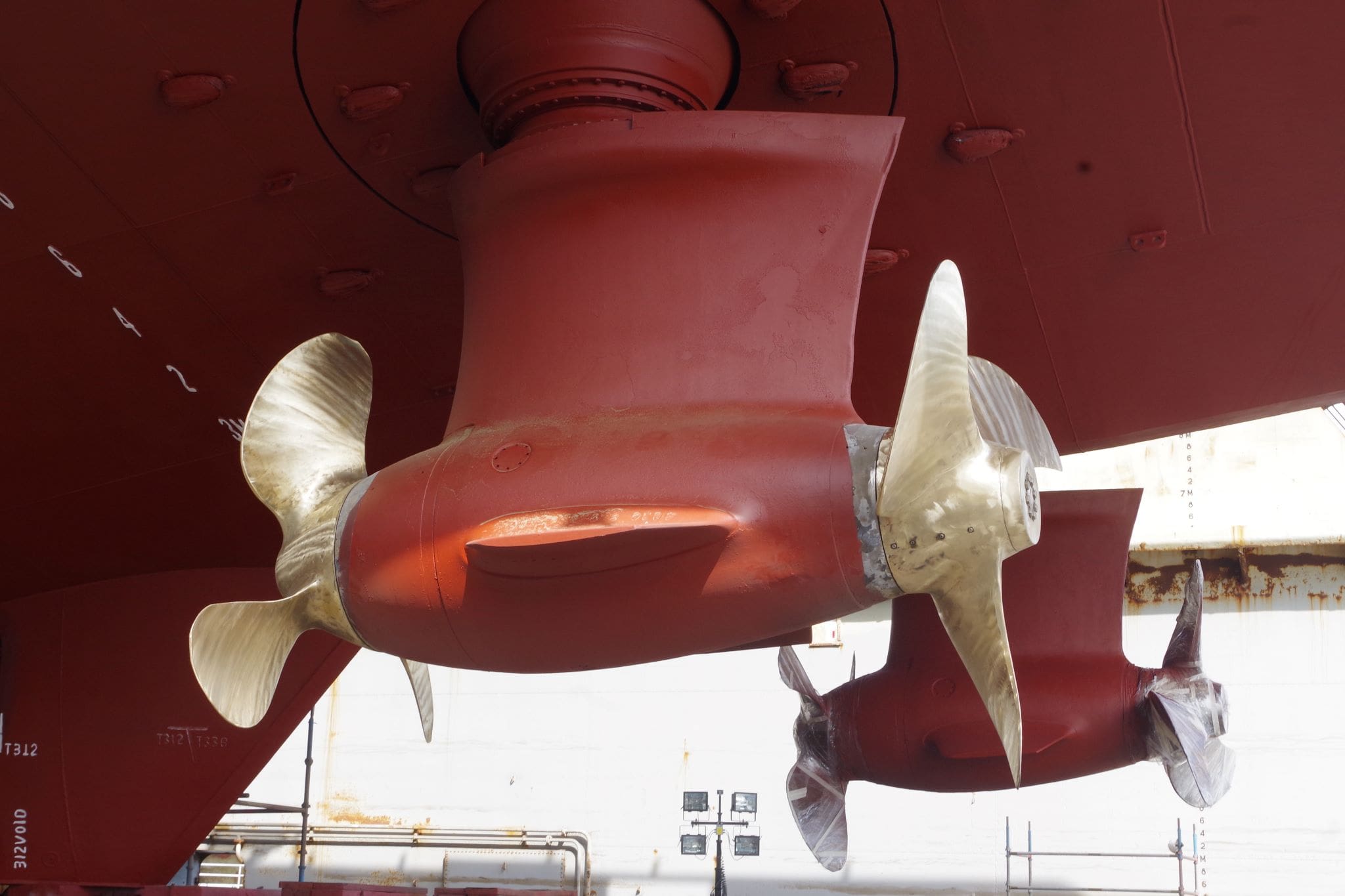 double propellers on a large shipping vessel with possible new hull coatings
