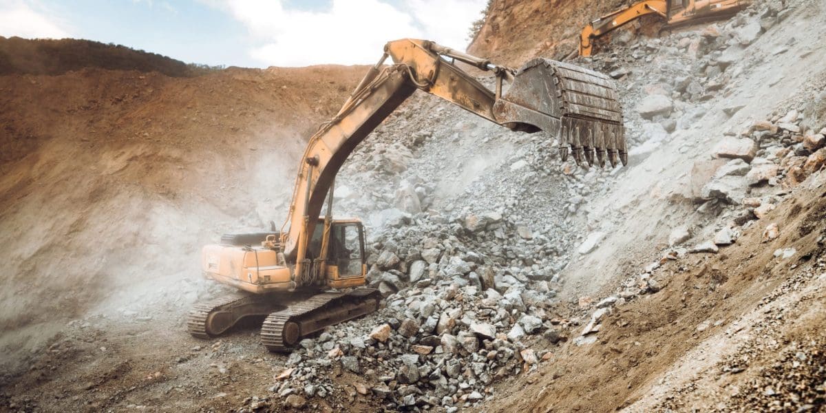 industrial-heavy-duty-excavator-moving-gravel-on-h-2021-08-28-18-45-58-utc